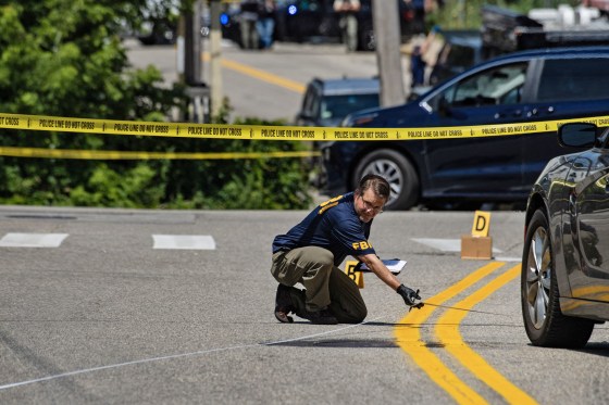 FBI investigators work the scene of ICE-involved shooting in Biddeford, Maine, on July 13, 2026.