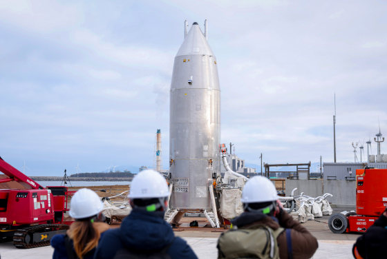 A photo shows the RV-X, a small Reusable Vehicle Experiment.