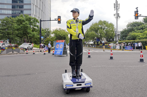 Humanoid Robots Take Up Traffic Duties In Shanghai