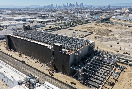 An aerial view of a aerial view of a 49.5 megawatt three-level data center under construction.