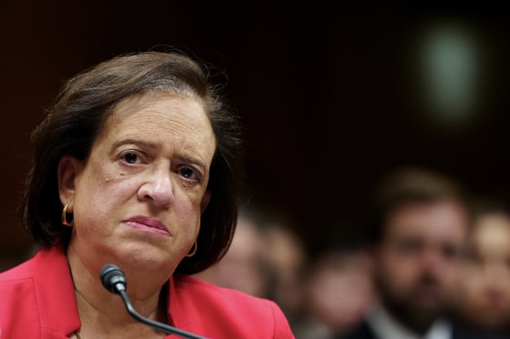 Elena Kagan looks toward the camera while seated behind a microphone.