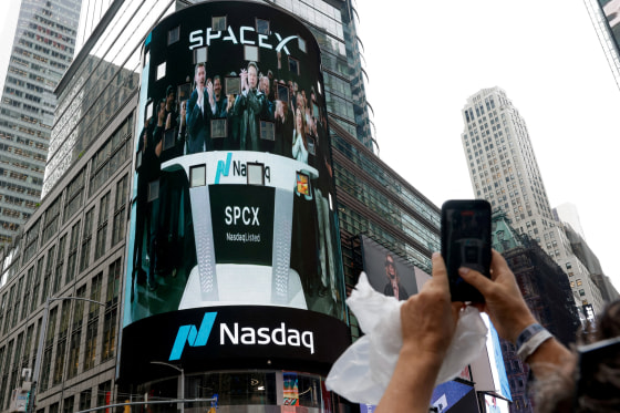 A billboard of SpaceX is pictured on the day of SpaceX's initial public offering (IPO) at the Nasdaq MarketSite, in New York City.
