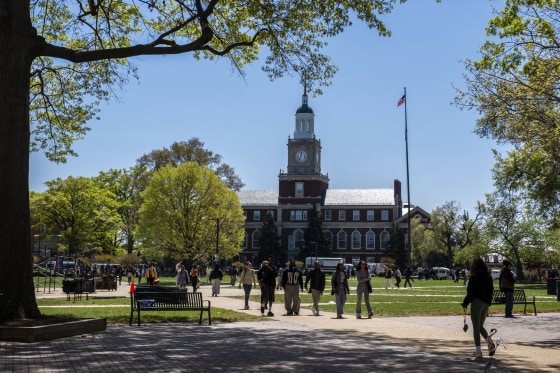 Students walk through the campus of Howard University.
