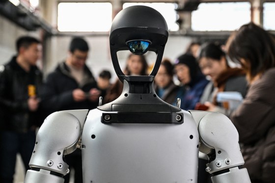 Humanoid robotics technology in a modern factory setting