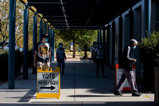 Voters enter Southeast Regional Library to cast their ballots on November 3, 2020 in Gilbert, Arizona. 