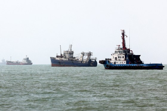 Three ships in a row on the water
