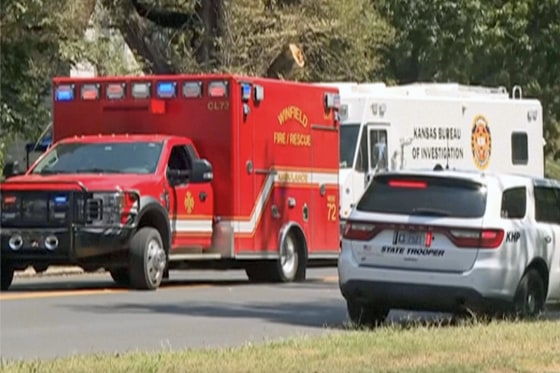 Emergency services at the scene of a shooting in Winfield, Kan., on Tuesday.
