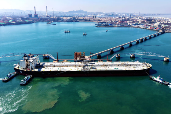 Image: A crude oil tanker at a port oil terminal 