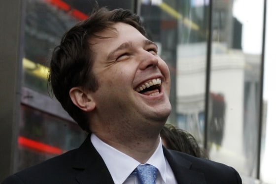 Maybe not so happy today. Groupon Chief Executive Andrew Mason smiles outside the Nasdaq Market following his company's IPO in New York November 4, 2011.
