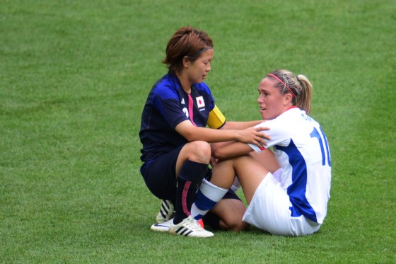 A moment of true sportsmanship, as Japan consoles a defeated France