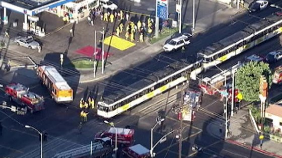 A Metro bus and a blue line train collided in Los Angeles on Monday. No injuries were considered life-threatening, according to fire-rescue officials.