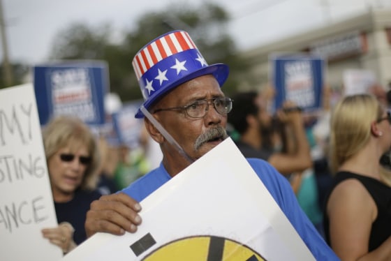 Demonstrators march during a union protest outside the Republican National Convention in Tampa. Union members plan to be out in force in battleground states this weekend.