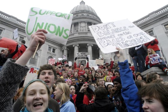 Students from Horlick High School in Racine, Wis., join thousands of others in protest at the statehouse in Madison, Wis., last year.