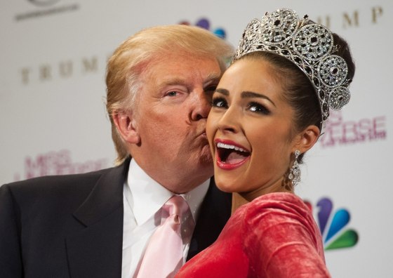Olivia Culpo, newly crowned Miss Universe 2012, poses with Miss Universe organizer Donald Trump during the press conference after the 2012 Miss Universe Competition in Las Vegas on Dec. 19, 2012.