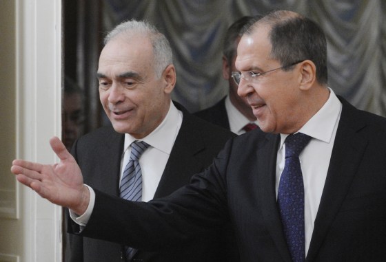 Russia's Foreign Minister Sergei Lavrov, left, speaks with his visiting Egypt counterpart Mohamed Amr as they meet on the Syrian crisis in Moscow on Dec. 28.