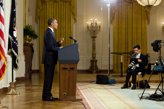 President Barack Obama makes speech to the nation on Afghanistan from the East Room of the White House, June 22, 2011. Pool photographer Pablo Martinez Monsivais is the first still photographer to shoot to shoot a live presidential address from the White House.
(Official White House Photo by Pete Souza)