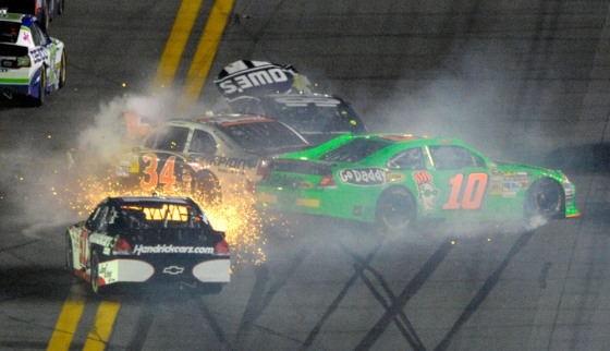 Danica Patrick (10), Kurt Busch (51), David Ragan (34) and Jimmie Johnson (48) crash during the NASCAR Daytona 500 Sprint Cup series auto race at Daytona International Speedway in Daytona Beach, Fla., Monday, Feb. 27, 2012. (AP Photo/Phelan M. Ebenhack)