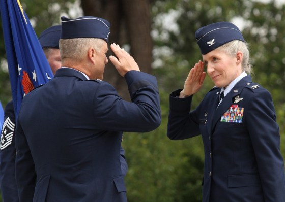 Col. Jeannie Leavitt, right, salutes 9th Air Force Commander Maj. Gen. Lawrence Wells after assuming command of the 4th Fighter Wing on Friday, June 1, 2012. Leavitt, the Air Force's first female fighter pilot, has now become the first female to take command of an Air Force combat fighter wing.