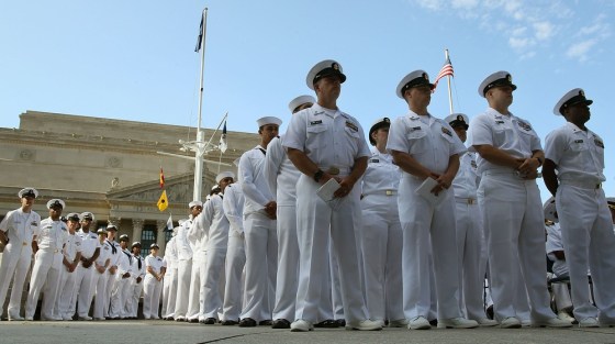 Navy personnel stand at attention during a ceremony and commemoration of the 70th anniversary of the Battle of Midway at the U.S. Navy Memorial on June 4, 2012 in Washington, D.C.