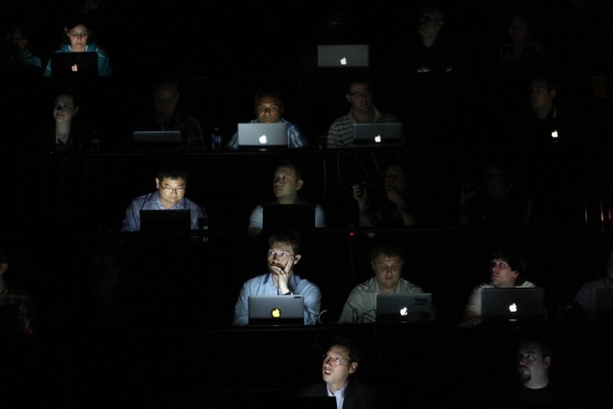 People in the audience are illuminated by the screens of their laptop computers during a Sony press conference on the eve of the Electronic Entertainment Expo (E3) on June 4, 2012 in Los Angeles, California. E3 is the most important yearly trade show the USD 78.5 billion videogame industry.