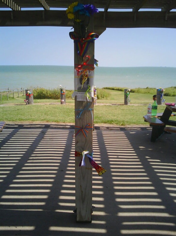 Rainbow ribbons, goodbye messages, flowers and cut-out hearts were left near the site where police believe Mollie Judith Olgin, 19, and Mary Christine Chapa, 18, were shot last week in Portland, Tex.