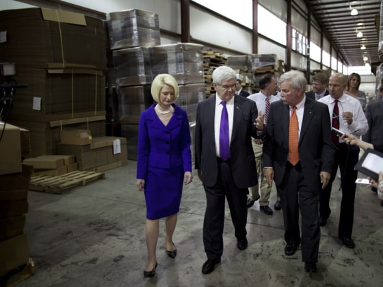 Republican presidential candidate, former House Speaker Newt Gingrich, center, and his wife Callista, tour the Wilheit Packaging factory on Wednesday, Feb. 29, 2012 in Gainesville, Ga. (AP Photo/Evan Vucci)