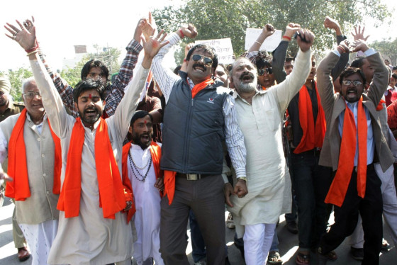 Indian right-wing Vishwa Hindu Parishad (VHP) activists shout slogans during a protest against filming scenes in the country depicting Pakistan's Abbottabad.