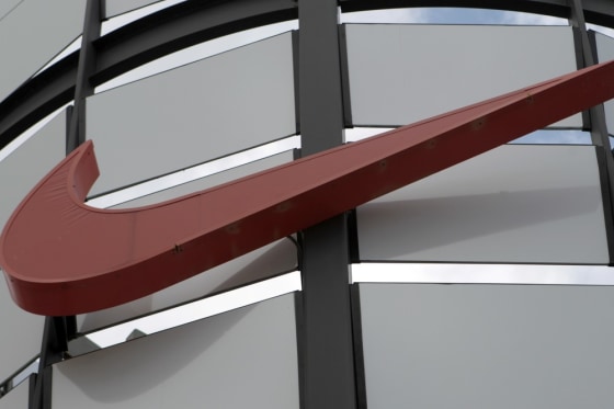 In this photo taken Sept. 20, 2011, the Nike logo is displayed at a Nike store in South Miami. Nike Inc., releases quarterly financial results Thursday, Sept. 22, 2011, after the market close. (AP Photo/Alan Diaz)