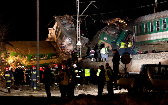 Rescuers work at the site of the train collision in Szczekociny, southern Poland Sudnay, March 3, 2012. Two trains collided head-on in southern Poland late Saturday, killing several people and injuring around 50 in what appears to be one of the worst rail disasters in the country in recent years, officials said. (AP Photo/Michal Legierski ) POLAND OUT