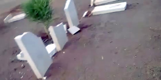 An image grab taken from a video uploaded on YouTube on March 3, 2012 perportedly shows broken headstones at the Benghazi War Cemetery and the Benghazi British Military Cemetery, the Commonwealth War Graves Commission (CWGC) said adding on its website that headstones were