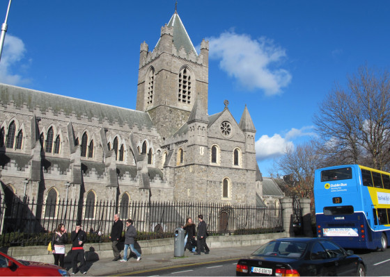Tourists and vehicles pass by Christ Church Cathedral in Dublin on Sunday, March 4, 2012. The cathedral is a cultural heart of Dublin's fair city, but Officials at the Cathedral said that they are distraught and perplexed over the theft of the church's most precious relic, the preserved heart of St. Laurence O'Toole, patron saint of Dublin. O'Toole's heart had been displayed in the cathedral since the 13th century, but on Saturday Feb. 3 a thief cut the relic from its fixings and made off with the heart of Dublin. (AP Photo/Shawn Pogatchnik)