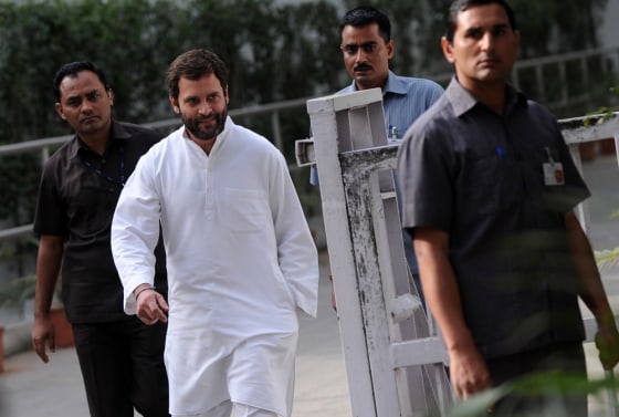 India's ruling Congress party General Secretary Rahul Gandhi (2L) comes out from his residence to address the media in New Delhi on March 6, 2012. Rahul Gandhi, the Congress party politician seen as India's prime-minister-in-waiting, accepted responsibility for poor results in state elections in which he had led campaigning. AFP PHOTO/ SAJJAD HUSSAIN (Photo credit should read SAJJAD HUSSAIN/AFP/Getty Images)