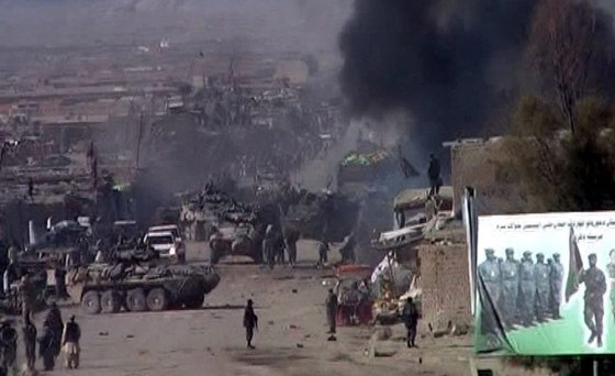 epa03135176 Smoke rises from the site of a bomb blast in Spin Boldak town of Afghanistan, along the Pak-Afghan border, Afghanistan 07 March 2012. A motorcycle bomb in southern Afghanistan near Pakistan’s border killed four civilians and injured eight, a government official said on 07 March. The bomb exploded in a crowded area in Spin Boldak district of Kandahar province on Wednesday morning, Parwiz Najib, a senior official in the provincial governor’s office said. EPA/AKHTER GULFAM BEST QUALITY AVAILABLE