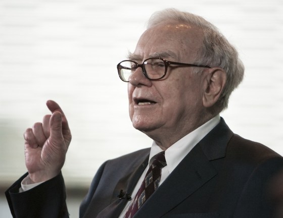 Investor Warren Buffett gestures during an interview prior to a special Berkshire Hathaway shareholders meeting in Omaha, Neb., Wednesday, Jan. 20, 2010. Berkshire shareholders have approved splitting the company's Class B shares 50-for-1 as part of the company's $26.3 billion acquisition of Burlington Northern Santa Fe Corp.(AP Photo/Nati Harnik)