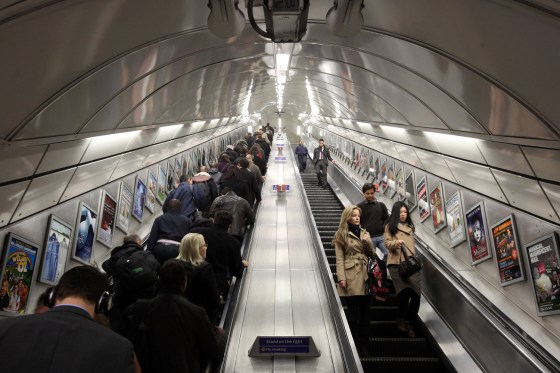 LONDON, ENGLAND - MARCH 05: Commuters make their way on the escalator at Angel underground station on March 5, 2012 in London, England. The escalators at Angel tube station are the longest escalators on the tube network. London's underground rail system, commonly called the tube, is the oldest of its kind in the world dating back to 1890. It carries approximately a quarter of a million people around its network every day along its 249 miles of track and 270 stations. The network has undergone several years of upgrade work and refurbishment in preparation for the Olympic Games which take place this summer. During this time the tube is expected to carry millions of visitors to and from the Olympic Parks. (Photo by Dan Kitwood/Getty Images)