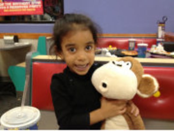 Officials took this photo of the child left behind at a Chuck E. Cheese's in order to get her back to her parents via the media.