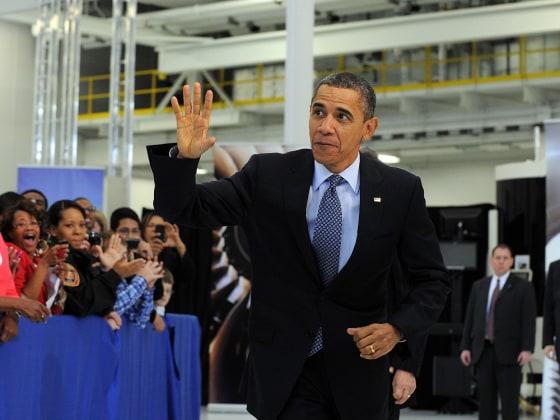 US President Barack Obama waves as he walks to the stage to speaks at the Rolls-Royce Crosspointe in Prince George, Virginia, on March 9, 2012. President Obama declared Friday that America "will thrive again" as another encouraging report on jobs growth delivered a new boost to his campaign for a second term. AFP Photo/Jewel Samad (Photo credit should read JEWEL SAMAD/AFP/Getty Images)
