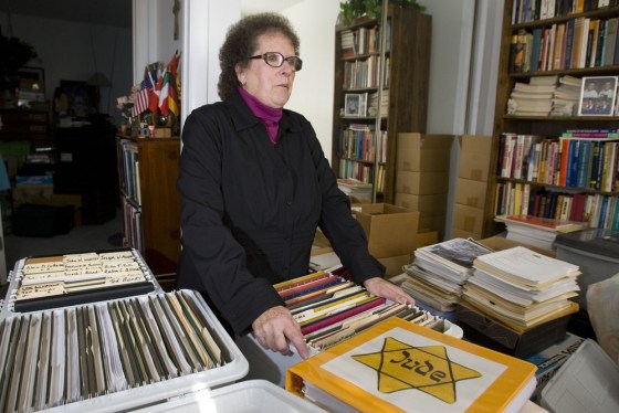 Helen Radkey is a researcher who has publicized the LDS Church's proxy baptisms of Holocaust victims and Catholic Saints. In this 2009 photograph, she goes through some of her numerous boxes of research files on the baptisms that take up part of an extra bedroom in her home. Mormon church leaders have put up a virtual firewall in their massive genealogical database to block out anyone who attempts to gain access to already red-flagged names of Holocaust victims. (AP Photo/The Salt Lake Tribune, Al Hartmann)