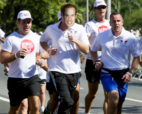 RIO DE JANEIRO, BRAZIL - MARCH 10: Prince Harry takes part in a fun run wearing a William mask on March 10, 2012 in Rio De Janeiro, Brazil. Prince Harry is in Brazil as part of a Diamond Jubilee Tour, representing Queen Elizabeth II, taking in Belize, the Bahamas, Jamaica and Brazil. (Photo by Arthur Edwards - Pool / Getty Images)