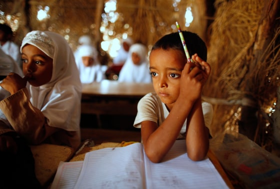 Students study during classes in a hut, in the al-Zailaea village of the western Yemeni province of Houdieda March 11, 2012. Around 300,000 children in Yemen have been denied access to quality education as a result of last year's conflict, according to the United Nations Fund for Children (UNICEF). In Houdieda province, the enrolment rate to primary education stands at 57 per cent for girls and 68 per cent for boys, according to 2010 statistics. REUTERS/Khaled Abdullah (YEMEN - Tags: EDUCATION SOCIETY TPX IMAGES OF THE DAY)