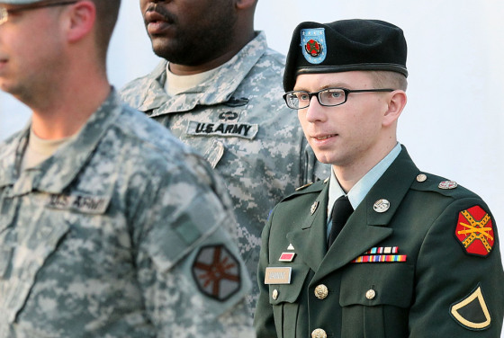 FORT MEADE, MD - FEBRUARY 23: Army Private Bradley Manning is escorted away from his Article 32 hearing February 23, 2012 in Fort Meade, Maryland. During the hearing, Manning deferred his plea to the 22 charges against him and deferred a decision over whether he wanted a military judge or a jury to hear his case. (Photo by Mark Wilson/Getty Images)