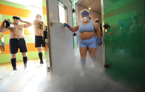 Participants exit the cryotherapy room at the cryotherapy division of the Olympic Sports Centre in Spala, 100 kilometres (60 miles) southwest of the Polish capital Warsaw on March 7, 2012. The cryotherapy division has become legendary since Wales came here in June 2011 and four months later powered into the World Cup semi-finals in New Zealand. AFP PHOTO / JANEK SKARZYNSKI (Photo credit should read JANEK SKARZYNSKI/AFP/Getty Images)