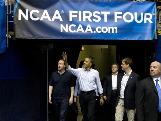 President Barack Obama and Britain's Prime Minister David Cameron arrive attend for the second half of the Mississippi Valley State versus Western Kentucky first round NCAA tournament basketball game, Tuesday, March 13, 2012, at University of Dayton Arena, in Dayton, Ohio. (AP Photo/Carolyn Kaster)