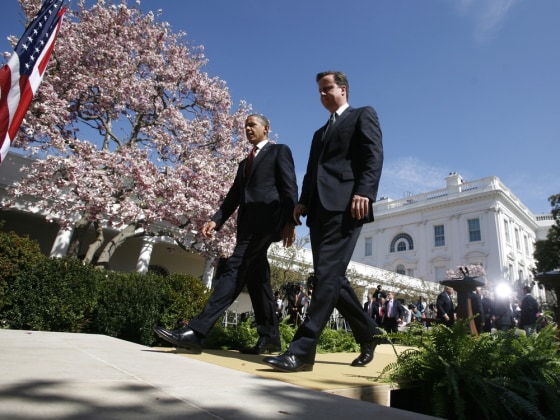 U.S. President Barack Obama and British Prime Minister David Cameron walk from their joint news conference at the White House in Washington March 14, 2012. REUTERS/Jason Reed (UNITED STATES - Tags: POLITICS)