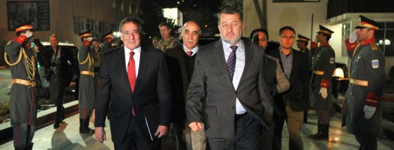 Afghan Interior Minister Besmullah Mahammadi (centre R) walks with US Secretary of Defense Leon Panetta (centre L) in Kabul on March 14, 2012. US defence chief Leon Panetta acknowledged that