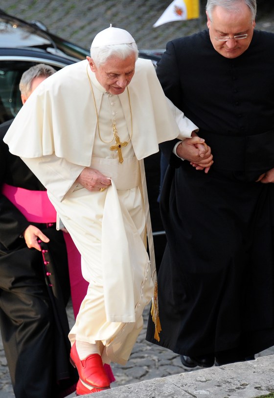 Pope Benedict XVI (L) arrives with Archbishop of Canterbury Rowan Williams (unseen) to celebrate the Vespers at San Gregorio al Celio Basilic in Rome March 10, 2012. REUTERS/Vincenzo Pinto/Pool ( ITALY - Tags: RELIGION)