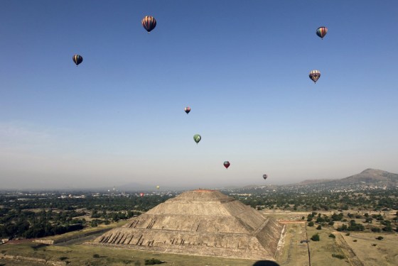 Hot air balloons float above the Pyramid of the Sun of Teotihuacan during the international hot air balloon festival outside Mexico City on Saturday.