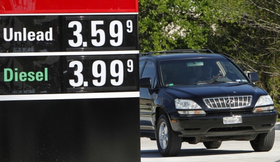 A sign shows gas prices as a driver pulls in to a newly opened QuickTrip (QT) filling station Monday, March 26, 2012, in Dallas. Gasoline has already reached a nationwide average of $3.90 per gallon, less than a dime from last year's May high. (AP Photo/Tony Gutierrez)