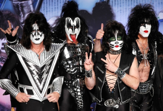 Rock band Kiss (from L-R) Tommy Thayer, Gene Simmons, Eric Singer and Paul Stanley pose at a news conference to announce the