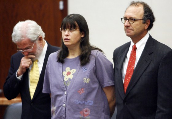 Andrea Yates, flanked by her lawyers, George Parnham, left, and Wendell Odom, stood as her murder conviction was overturned by reason of insanity. Yates, who murdered her five children, will ask a judge for a two-hour weekly therapeutic pass to attend church.